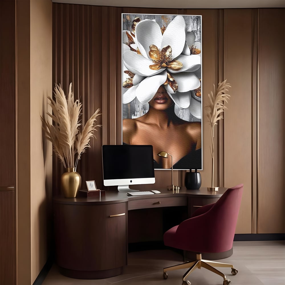 Tablou canvas cu tablou canvas cu femeie si magnolie alba, in rama de aluminiu argintiu, pe perete intr-un birou